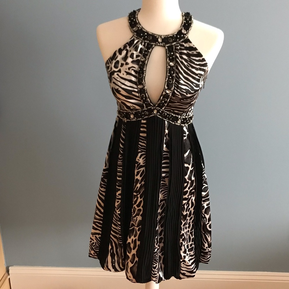 Cache black and white animal print dress, size 2